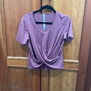 Color is more of the mauve color, lighting of photo makes it look purple.